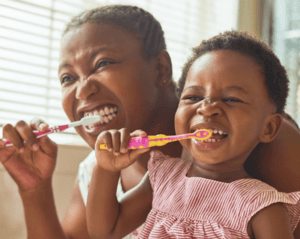 Mom and toddler practicing new developmental skills at home